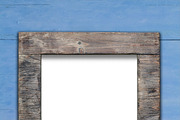 Empty frame on wooden surface