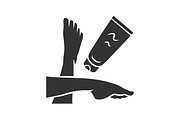 Moisturizing foot cream glyph icon