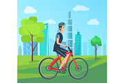 Man in Helmet Rides Bicycle through