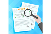 Hand examining resume forms