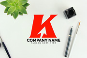 k letter arrow logo