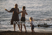 Mum with playful children on the