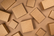 Brown cardboard boxes on craft paper