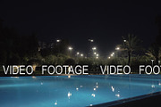 Outdoor pool on hotel area, night