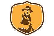 Amish Carpenter Holding Hammer Crest
