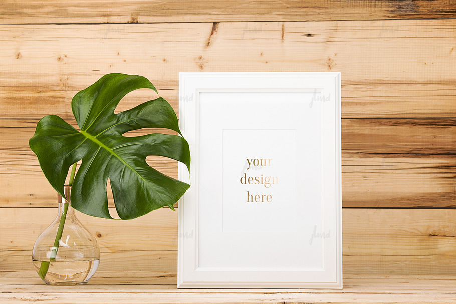 White frame with monstera leaf in Print Mockups - product preview 8
