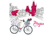 Girl rides a bike in Prague